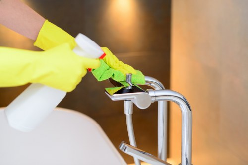 Office cleaning team working in a Chiswick workplace reception area
