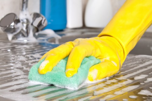 Detailed post-renovation cleaning of kitchen surfaces and fittings in Chiswick